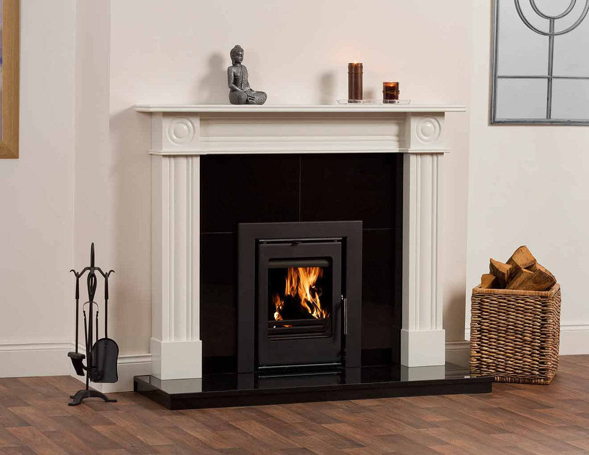 Firewarm 6kW cassette stove in a Regent Perla White surround