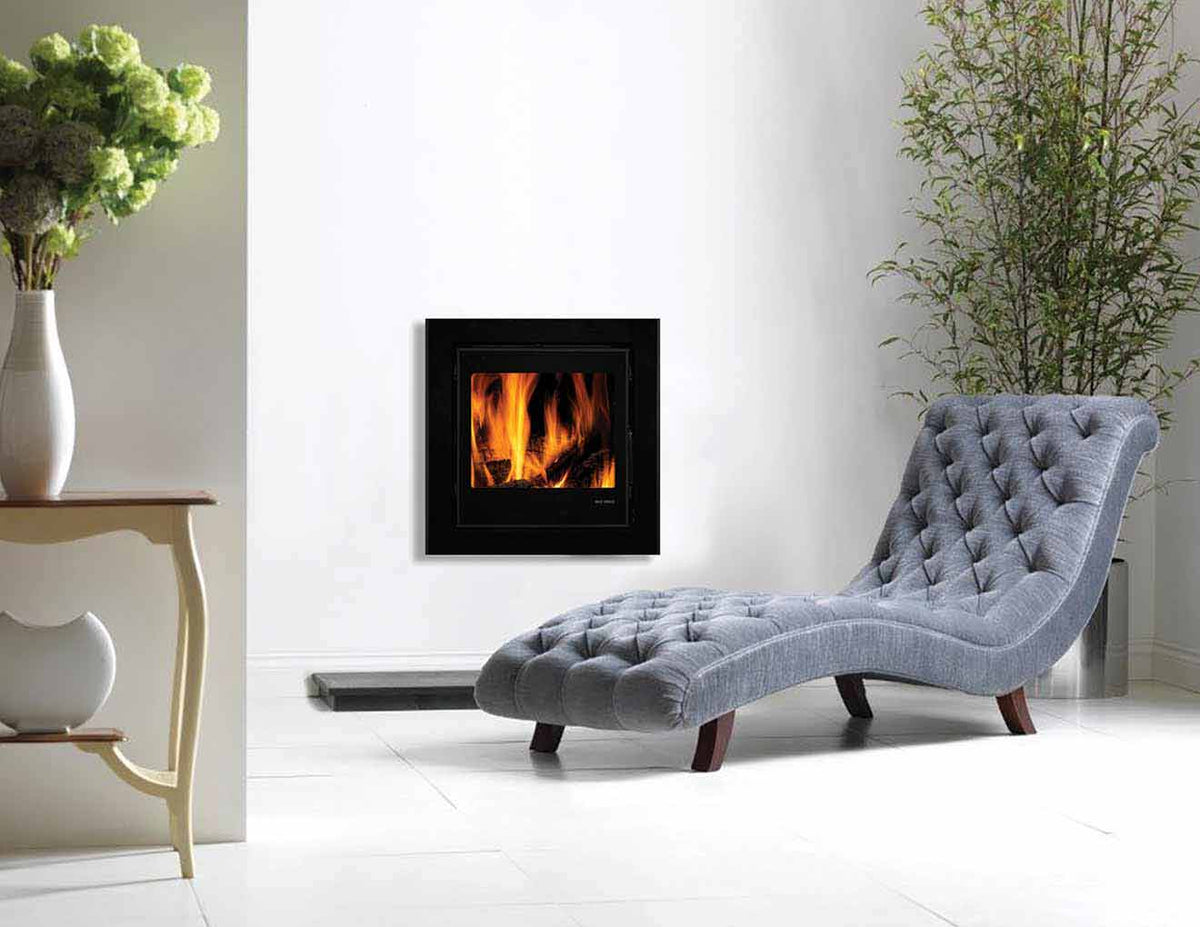 Firewarm 9kW cassette stove wall mounted in a living room